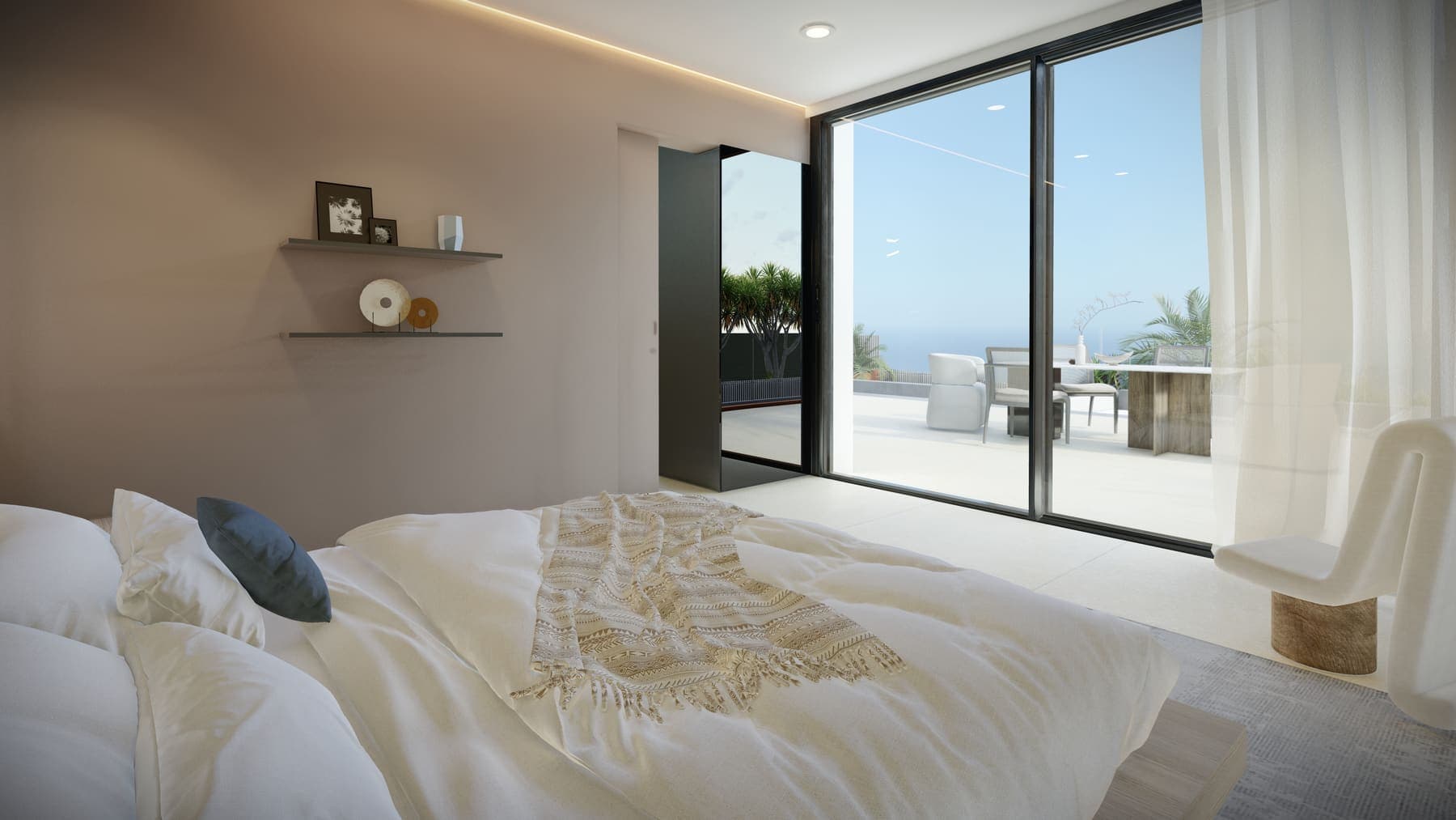 Dormitorio con salida a terraza y vistas al mar en vivienda unifamiliar de Urbara en Tenerife